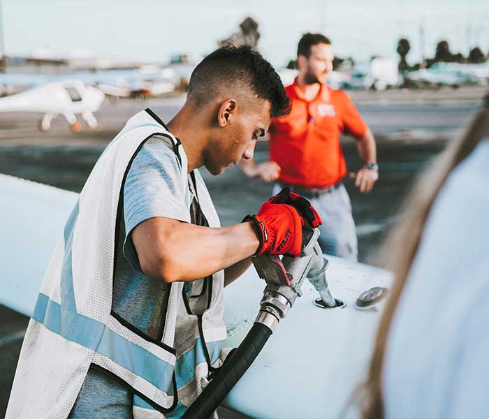 Close-up of a jet fuel nozzle ready for aircraft refueling